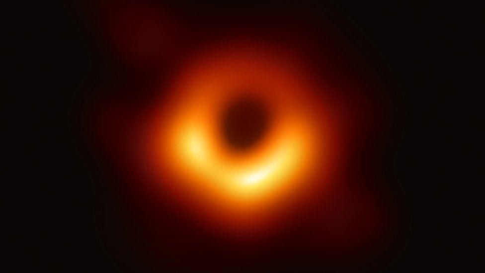 Astronomers capture first image of a black hole.